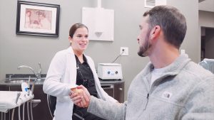 Dr. Hall greets patient