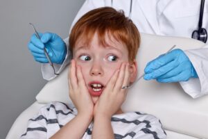 kid with dental anxiety